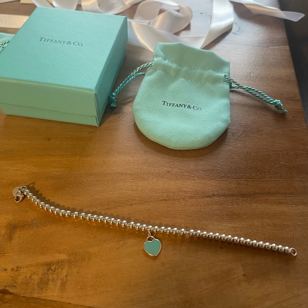 Tiffany & Co. Silver Bracelet with Blue Heart Charm